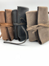 Green, Brown, and Black leather travel watch rolls